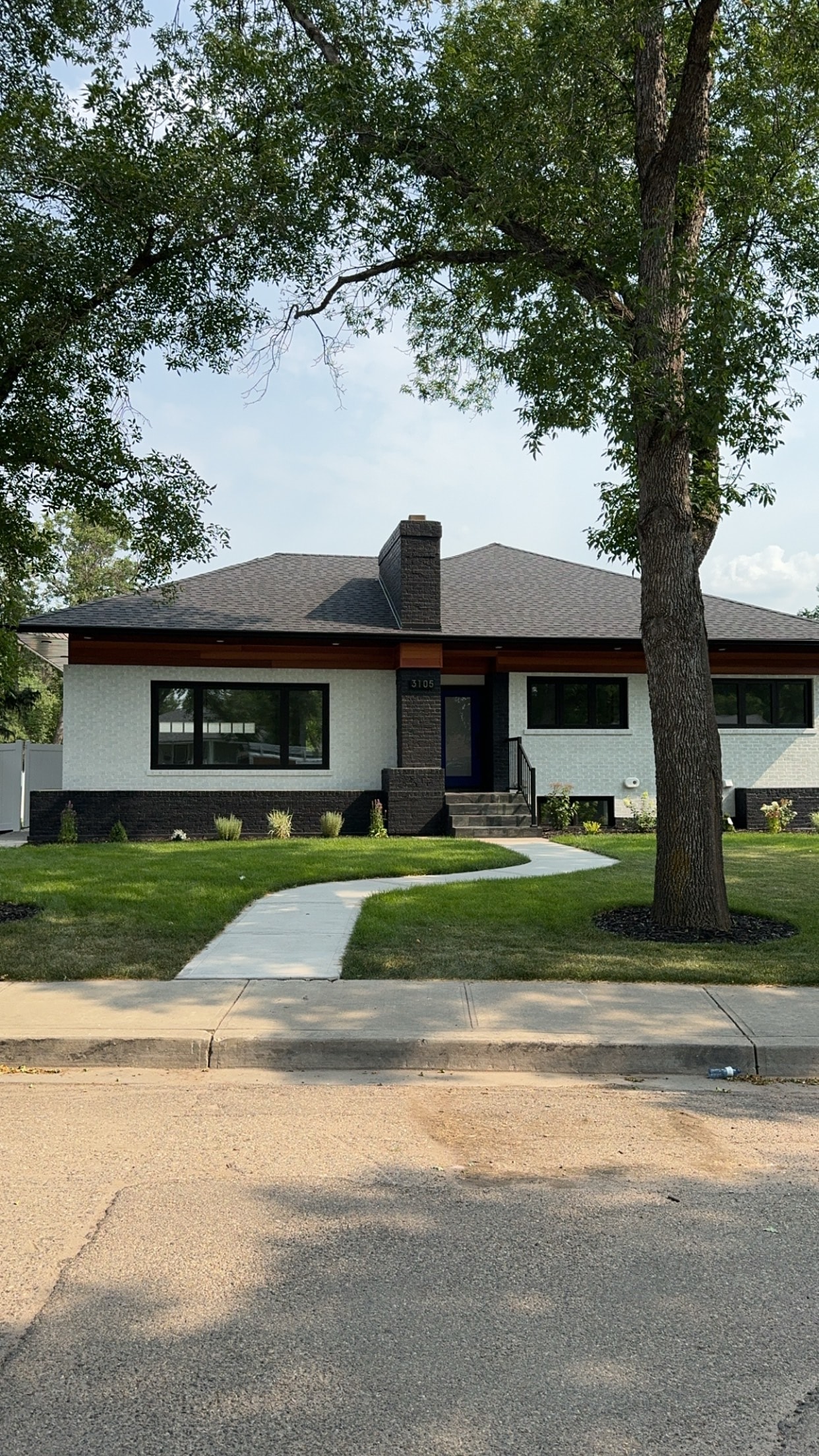 Finished home exterior with landscaping Regina